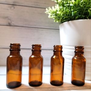 Set of 4 small apothecary jars